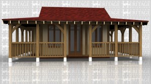 A 3 bay central building with covered areas and balustrading on 3 sides.