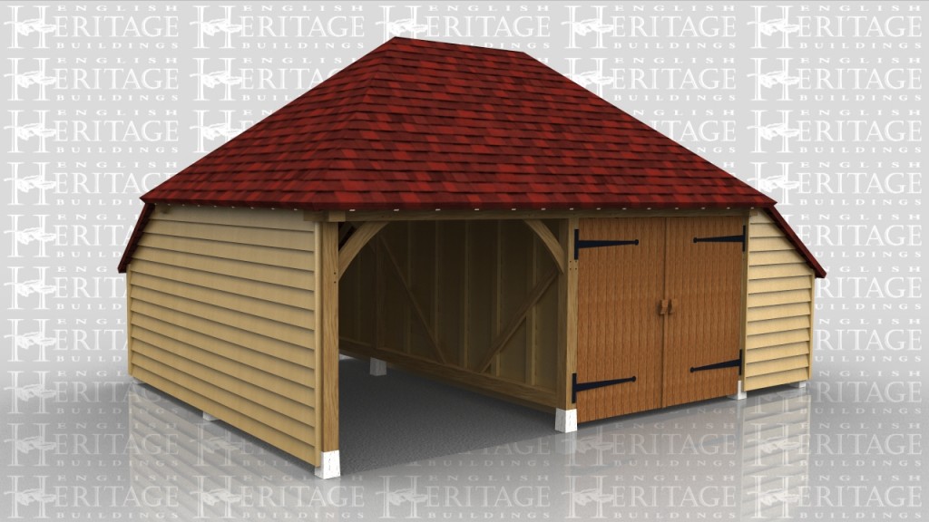 Two bay oak framed garage with central partition and garage doors to one side. This building sits on staddle stones on top of concrete pad foundations so there is no bickwork or oversite required.