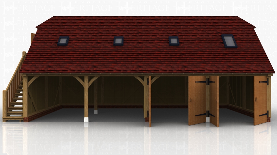 Four bay oak framed garage with external oak staircase leading up to the first floor space that has 4 rooflights. There are two open car bays and two enclosed with garage doors.