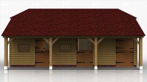 A block of 3 stables each with a softwood stable door and a softwood mullion window.