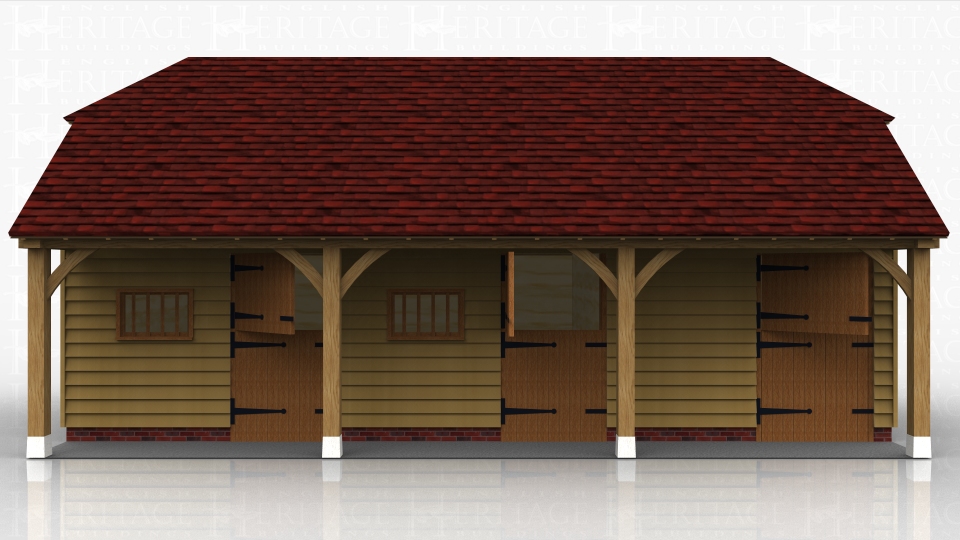 A block of 3 stables each with a softwood stable door and a softwood mullion window.