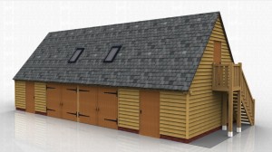 4 bay oak framed building with external oak staircase up to first floor space. The building has 2 sets of garage doors on the centre two bays with weatherboard and single doors to the other two bays.