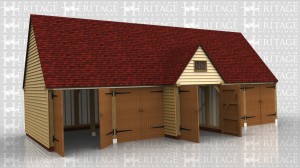 This 5 bay garage block is attached to an existing building one end and from the front looks like five garage bays all with garage doors. In fact the centre bay has a projecting barn entance on both the front and the rear and is in fact a drive through.