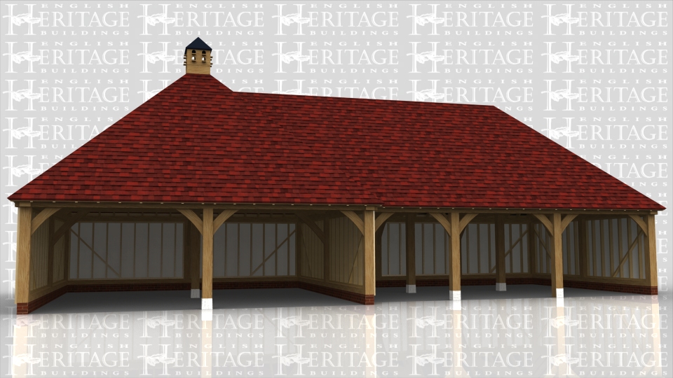 This building comprises of two frames. The first is a large square frame with hipped roof and a dovecote at the top. The second frame attached to it comprises of 3 open bays, 2 for cars and the other slightly smaller for garden machinery or motorbikes.