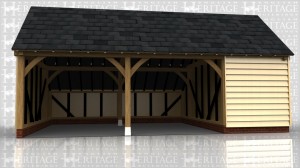 This oak framed garage has three bays; two are open and one is enclosed.The enclosed bay is accessed via a single door to the right hand side, and has a two pane window. There is an enclosed logstore to the rear of the building, which becomes an open logstore at the end bay.