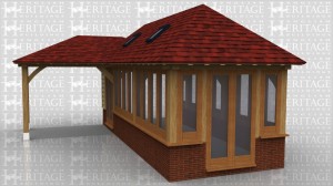 A fully glazed oak frame extension sitting on a dwarf brick wall with a covered walkway to the entrance doors. Four velux roof lights help to bring as much light into the building as possible while the barn hip roof end where the extension adjoins the house allows clearance to the existing house upstairs window.