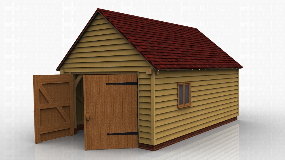 This oak framed garage has a single bay. The garage is accessed via a set of garage doors on the left hand side, and there are two pane windows to the front and to the right side.