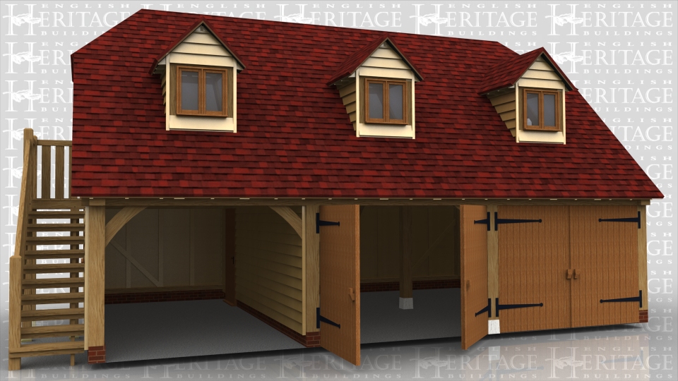 This oak framed two storey garage has three bays, two enclosed and one open. The enclosed bays have a set of garage doors to the front. The first floor is accessed by an external oak staircase on the left hand side and a single solid door. The building has three dormers to the front; each with a two pane window.