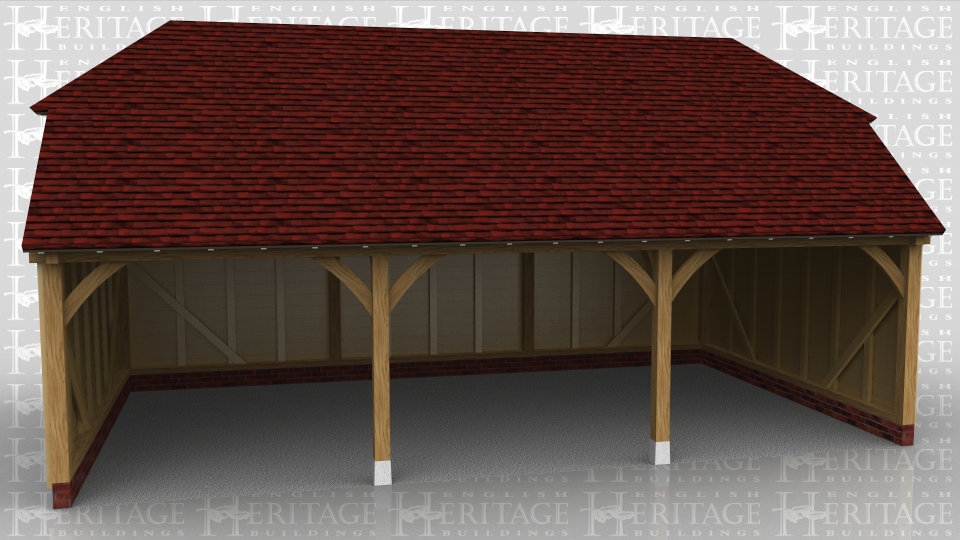 This oak framed garage has three bays that are open to the front.