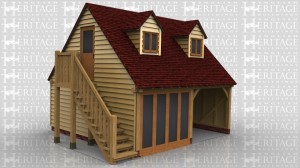 This two storey oak framed garage has two bays; one open and one enclosed. The first floor is accessed via an external oak staircase to the left hand side and a half glazed door. The enclosed bay has full length opening garden room windows to the front. On the first floor there are two dormers to the front, each with a two pane window, and a three pane window to the left side.