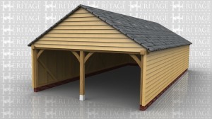 This oak framed garage has two enclosed bays. The bays are accessed via the right side of the building which is left open.