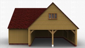 This oak framed garage is formed of two different frames. One is a two bay, two storey garage. Both bays are enclosed to the front and accessed by the left side of the building which is left open. Access to the first floor is provided by a hatch, and there is a three pane window to the left and right sides of the building. There is a smaller two bay building attached to the rear, designed to be used as a store or workshop and accessed by a single door to the front.