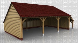 This 3 bay garage has a gable end on the left and a full hip and catslide roof over a logstore on the right. There is also a rear catslide to keep the ridge height below 4m but still maximise the internal floor area.