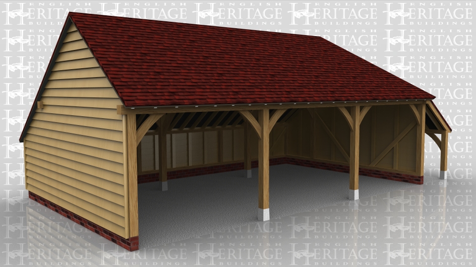 This 3 bay garage has a gable end on the left and a full hip and catslide roof over a logstore on the right. There is also a rear catslide to keep the ridge height below 4m but still maximise the internal floor area.