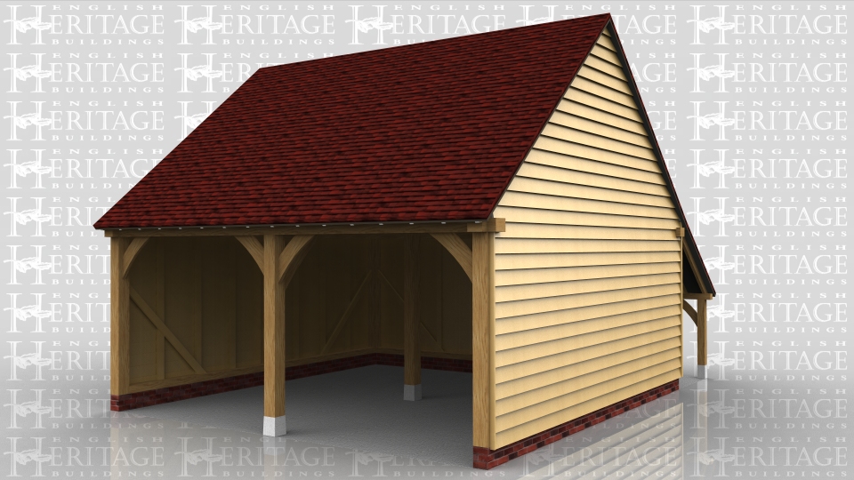 A two bay open fronted garage with gable ends and a log store at the rear.