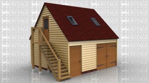 This 2 bay building has one garage bay secured with traditional side hung garage doors with a seperate workshop / store accessed by a solid single door. The building is a raised plate design and the first floor is accessed via an external oak staircase. There is a 2 light window in the gable end and 2 Velux rooflights in the front roof slope.