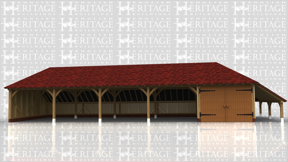 This building is a five bay garage block with four open bays and one enclosed by a partition and garage doors on the front. The roof has hipped ends and a logstore on the right hand side.