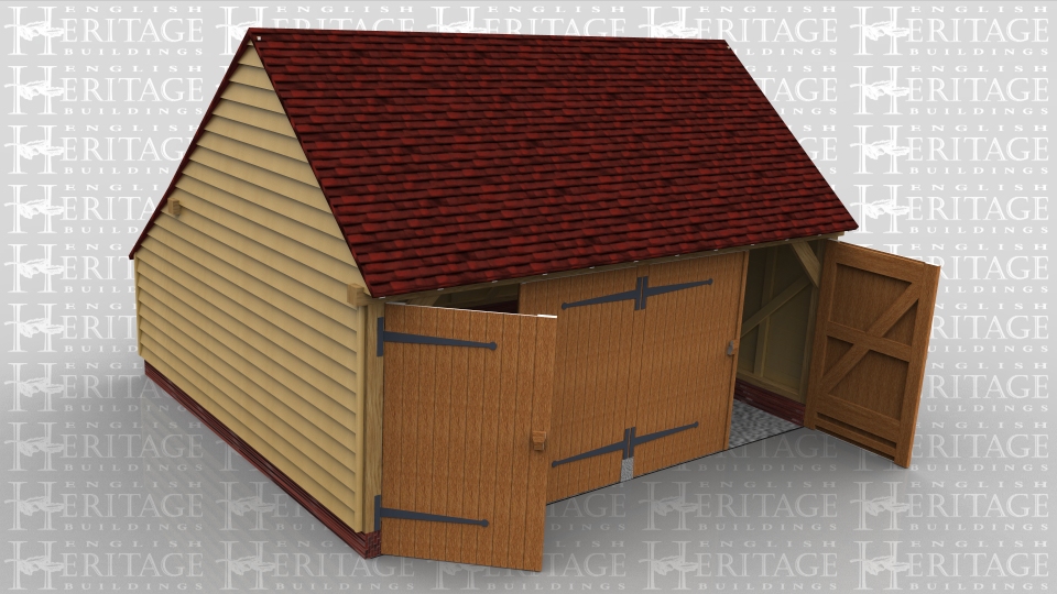 This is a 2 bay garage with gable ends and a rear catslide. It has 2 pairs of garage doors on the front to make it secure.