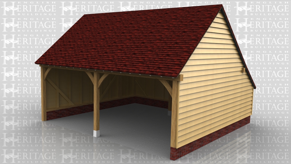 This is a two bay open fronted garage with gable ends and a catslide roof at the rear.