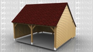 This 2 bay garage with gable ends and rear catslide is built on staddle stones instead of brickwork and is stepped down at the rear because of the sloping ground.