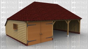 This is a 3 bay garage with double hipped roof and rear catslide. The left hand bay is a secure garage bay with a partition and pair of garage doors. The other two bays are open fronted car spaces.