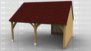 This 2 bay building is a car port with solid sides on the right and half way along the rear. The rest of the building is open sitting on staddle stones.