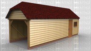This is an open fronted one bay garage with a barn hip over the opening. Behind the garage bay is an enclosed store area which is accessed via a solid single door and there is also a mullion window.