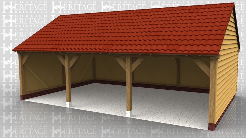 This is a full span open fronted 3 bay garage with gable ends. It has a low pitch and a pantile roof.