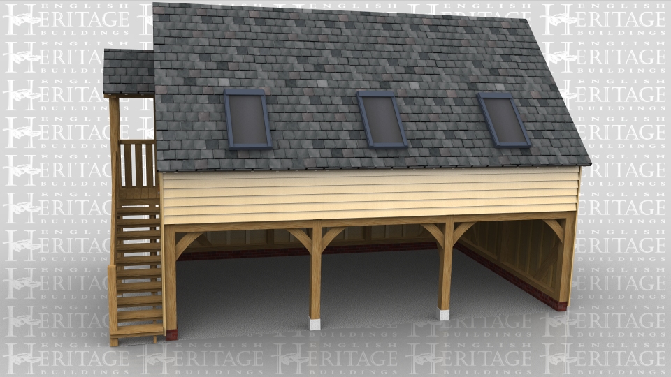 This oak frame is a three bay sling brace design with gable ends and a covered external oak staircase. There are three open garage spaces and upstairs there is one open space with a large opening glazed unit in the end wall. There are three large velux rooflights to get plenty of natural light into the room.