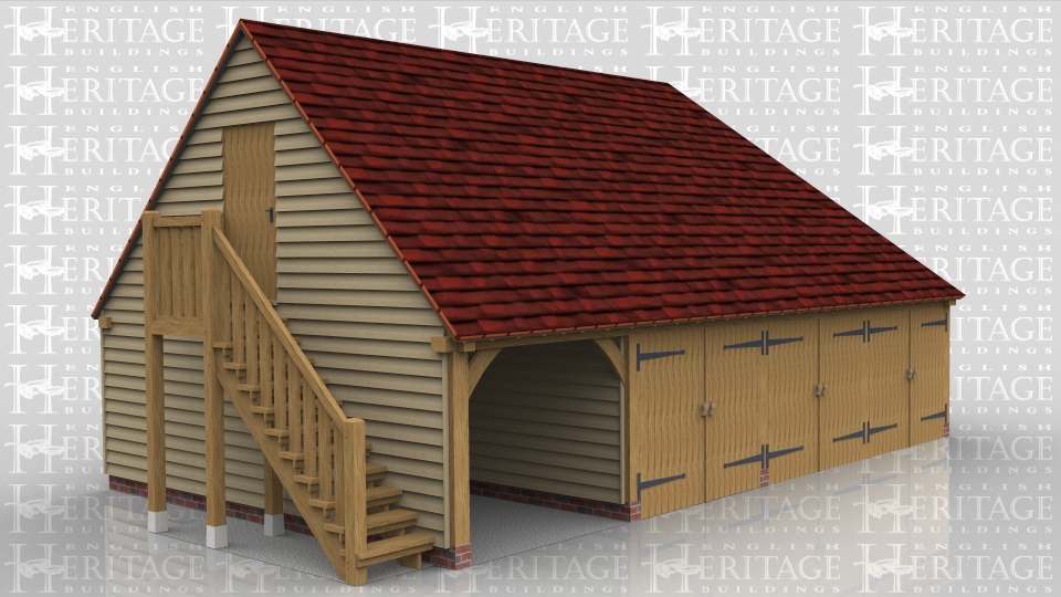 This oak framed garage with first floor has one open fronted parking space and three enclosed spaces that have garage doors on the front. There is an external oak staircase leading to a solid single door which accesses the first floor. The upstairs is one open space and there are three rooflights on the rear elevation, one of which is a means of escape.