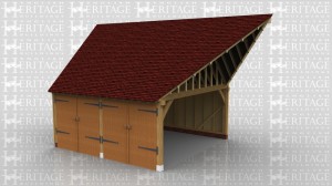 This is a two bay oak framed garage that is attached to the side of the house. The roof connects to the existing with a roof conection kit on lay boards. The oak garage is secured with two pairs of garage doors to the front.