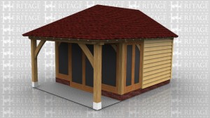 This oak frame is used as a small summerhouse/garden room. The fully glazed unit on the front is set back so there is a small veranda. Part of the side walls are glazed and the rest along with the rear are clad in weatherboard.. At the rear is a small enclosed logstore accessed via a small door at the end.