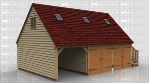 This is a three bay oak framed garage with first floor. There is one open fronted bay and the other two are enclosed using a partition and two pairs of garage doors. The first floor is accessed through a solid single door at the top of an external oak staircase.There are six Velux conservation rooflights in the front of the roof and a two pane escape casement window in the gable.