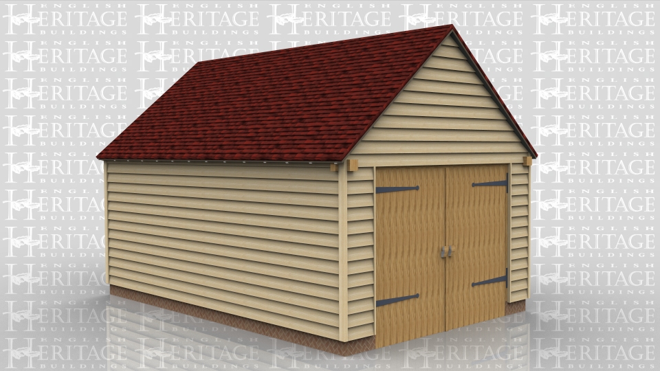 This oak framed garage has two bays that are enclosed to the front and accessed via a set of garage doors to the right side.