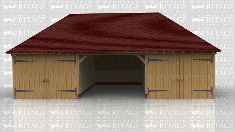 This three bay oak framed garage has hipped ends and an enclosed rear logstore. The bays are wider than normal to give that little bit of extra room as the outside two bays are enclosed with partitions annd garage doors leaving the centre bay open at the front.