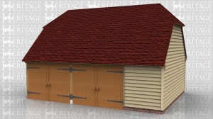 This is a full depth oak framed garage with barn hip ends. Two bays have garage doors on the front and the third smaller bay has a partition across the front to make a large clear area inside.