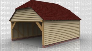 This oak framed building is a wide garage with two enclosed bays. Access is via an open left side and a single half glazed door on the right side.