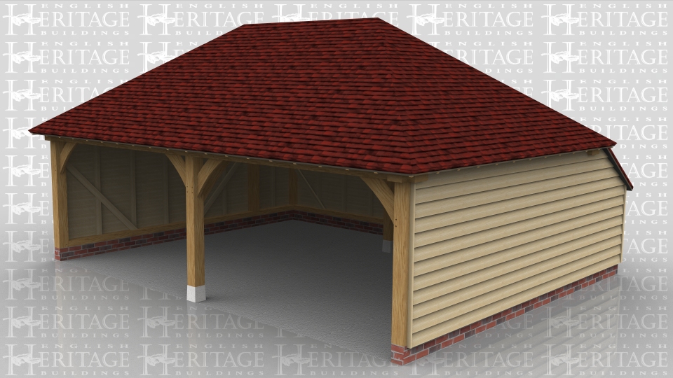 This oak framed two bay garage has extra wide bays, hipped roof ends and an enclosed store to the rear.
