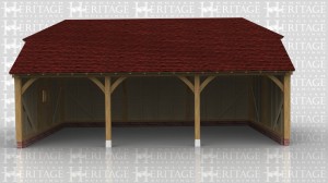 This oak framed building is a full depth three bay open fronted garage with barn hip roof ends. There is also a mullion window in the left hand side.