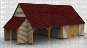 This oak framed building has two open fronted garage bays and two bays partitioned off to form two workshop areas. Each of these workshops has a wide solid door front and rear and the end one has two pane casement windows. The first floor is used for storage and is accessed via a hatch. The building has gable ends and a hay barn style single solid door in the first floor right gable and a small store building on the left hand side.