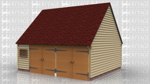 This oak framed garage has two full bays with garage doors on the front and a smaller bay that has a partition and mullion window in the front. There is also a wide solid single door in the left hand side. Two bays are floored and access is via a hatch from the smaller bay. There is also a mullion window in the gable end.