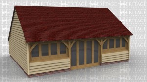 This oak framed home leisure building is formed of three bays and has full length glazing in the centre where two panes open as doors. The other two bays at have full width windows sitting on a low weatherboarded wall. Also at the rear is an enclosed store covering one bay width which is used as a toilet.
