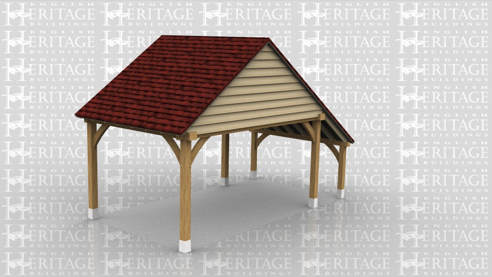 One bay oak framed car port with a small logstore to the side.