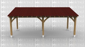 Oak framed lean-to car port against an existing building.