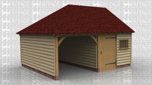 This oak framed two bay garage has one bay with an open entrance and one enclosed bay. The enclosed bay is designed to be used as a workshop or storage area and is accessed by a single door at the front.