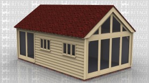 This oak framed home leisure building is formed of three enclosed bays, with two opening garden room windows to the front, and two sets of three pane windows. To the right end there is a glazed gable and full length glazing to the side of the bay.