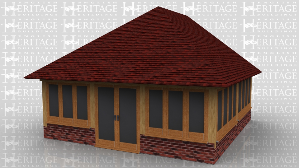 This oak framed three bay oak framed garden room extension to a house is sitting on a dwarf cavity brick wall apart from the fully glazed doors. Full glazing on all three sides.