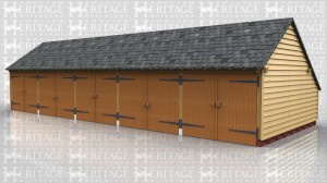 This oak framed five bay garage has five sets of garage doors and an enclosed log store to the side. The building also has an enclosed store to the rear.