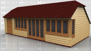 This oak framed home leisure building is formed of four enclosed bays and has a pair of doors for access at the front and full length windows along the front wall. There is also a mullion window to the side.