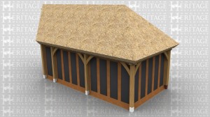 This oak framed home extension is designed to be attached to an existing building. It has one side of softwood weatherboard and the other side has full length windows.